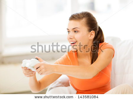 Stock-photo-picture-of-happy-woman-with-joystick-playing-video-games-143581084