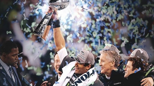 Seattle-seahawks-quarterback-russell-wilson-holds-the-vince-lombardi-trophy-aloft-after-winning-the-super-bowl-facebook_medium