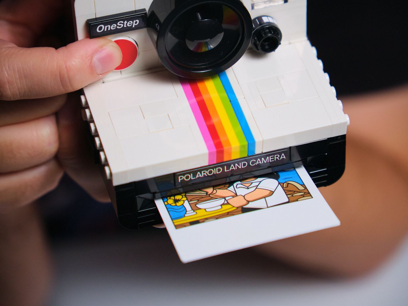 The result: when you press the shutter button, the Lego Polaroid shoots a photo out of its slot.