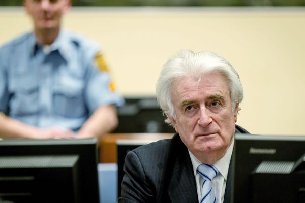 Karadzic sits as the verdict is read.